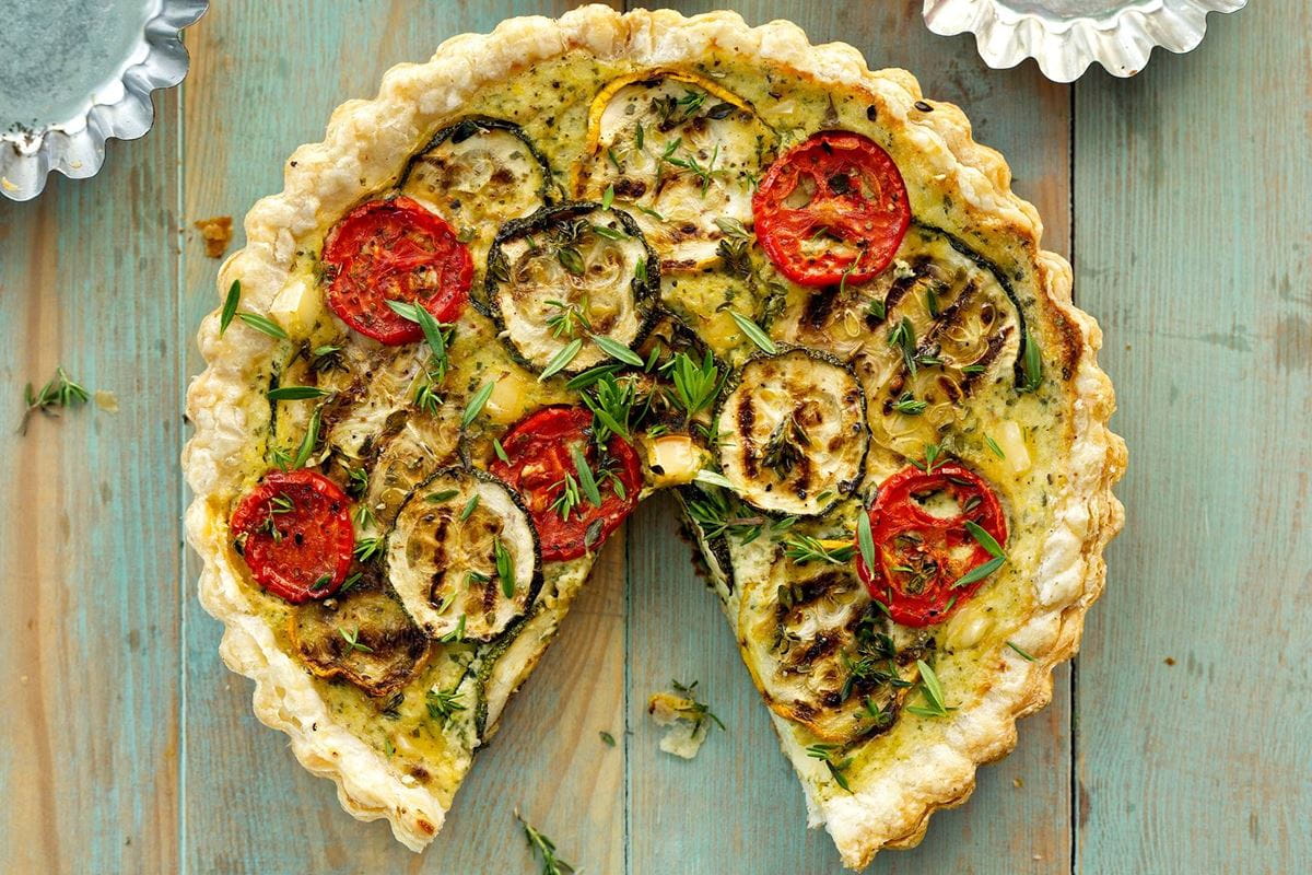 recipe image Slané koláčky s cuketou a rajčaty